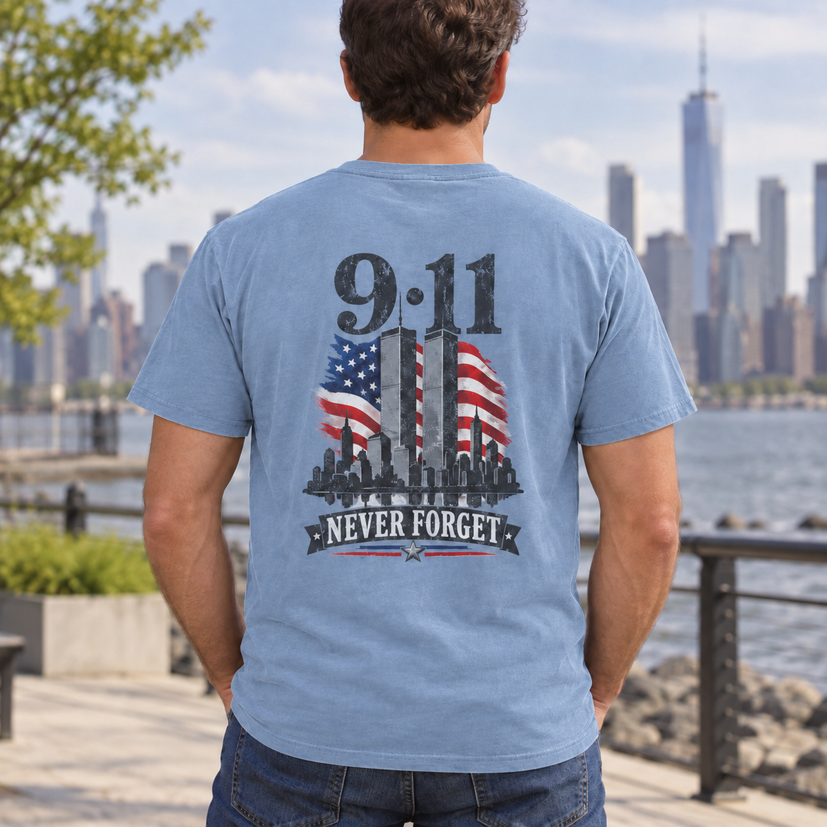 Male model wearing 9/11 Never Forget T-shirt in Chambray, back view