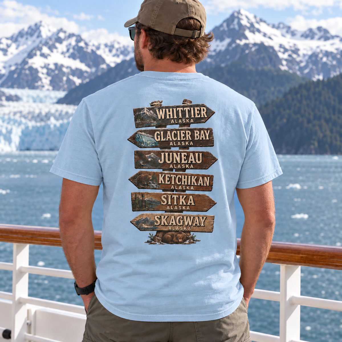 Real model wearing Alaska Town Sign T-shirt in Chambray, back view