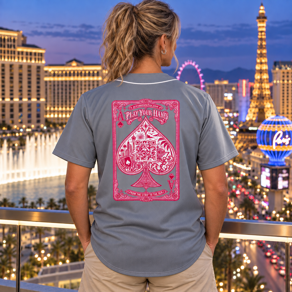 Woman wearing Aces & Anchor Pink Ace grey baseball jersey, back view