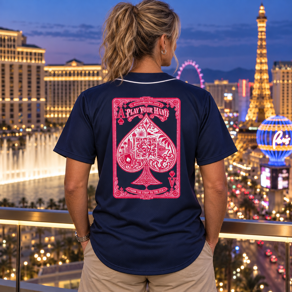 Woman wearing Aces & Anchor Pink Ace navy baseball jersey, back view