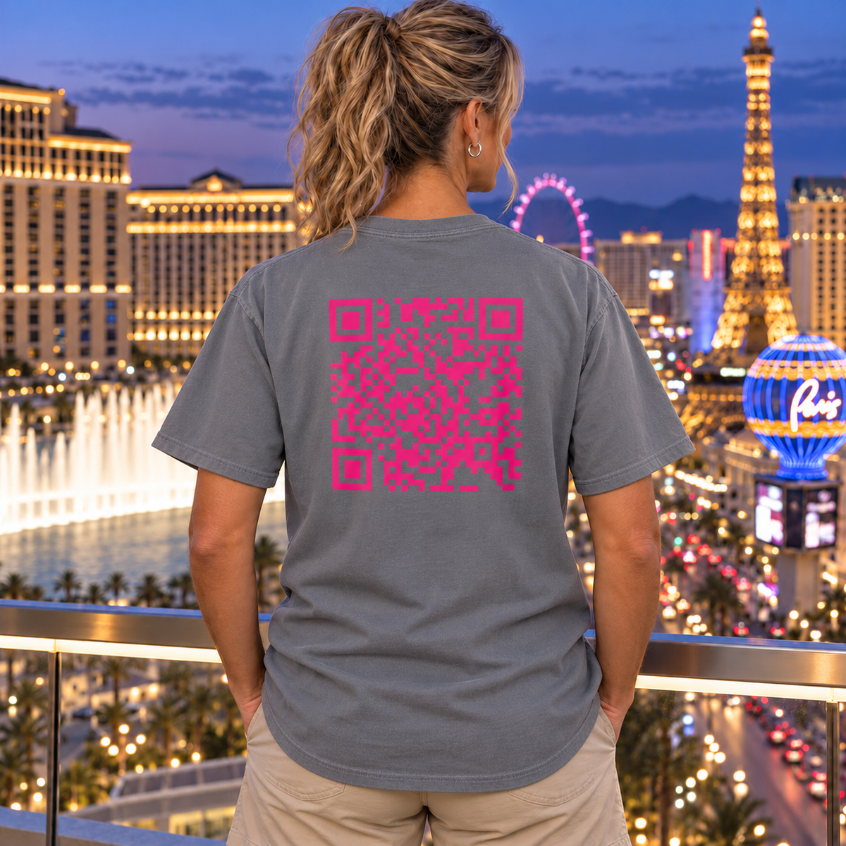 Woman wearing the Aces & Anchor Pink QR Code Grey garment-dyed T-shirt, back view